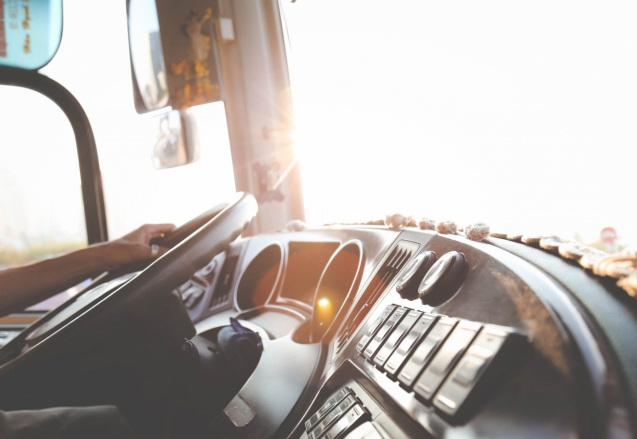 person-hand-on-steering-wheel-977213-scaled-1600x900